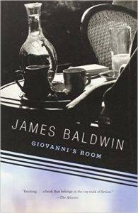 cover of Giovanni's Room by James Baldwin: black and white image of a water jug, creamer, and coffee mug on a tray with a wicker chair in the background; part of list of books to read this Pride